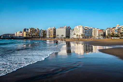 People On Beach Durings Sunset At Las Palmas de Gran Canaria, Spain