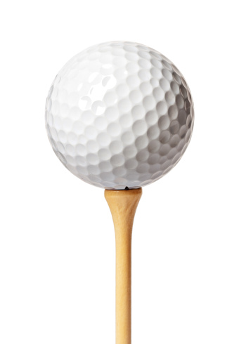 Golf ball on a tee isolated on white