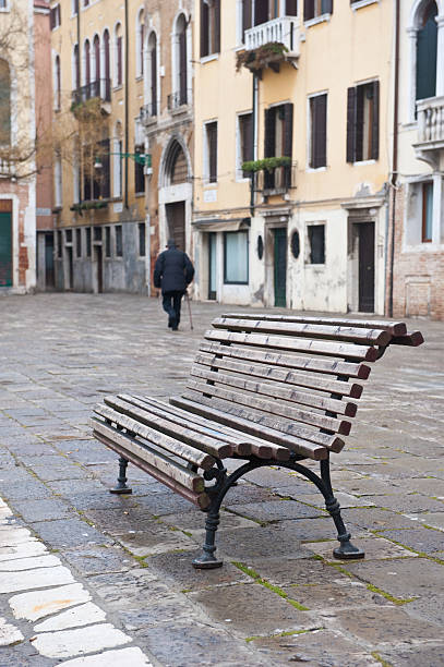 Park Bench in Compo St Polo, Venice, Italy stock photo