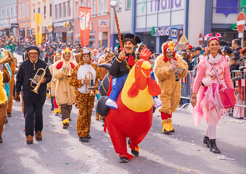 Villach, Austria - 2023 February 19: Carnival in Villach, Fasching, Participants in the annual parade wear colorful and masquerade clothing. Motto: Lei-Lei.