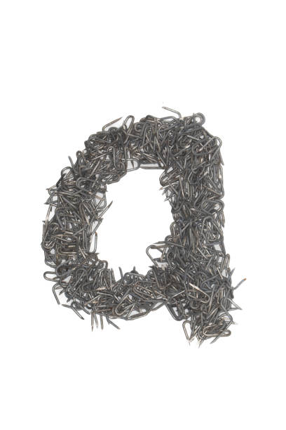 istock artistic lowercase Letter A made from steel staples isolated on a white background write, font, type style 1467696004