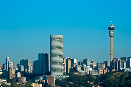 A Southern view of Johannesburg over Doornfontein with tall buildings and tower.
