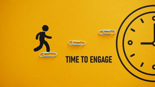 istock Time to engage is shown using the text and picture of clock 1467701136