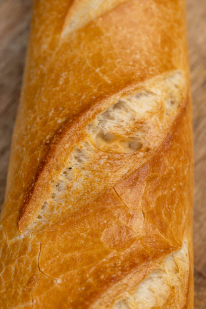 istock white wheat french baguette close up 1467705133