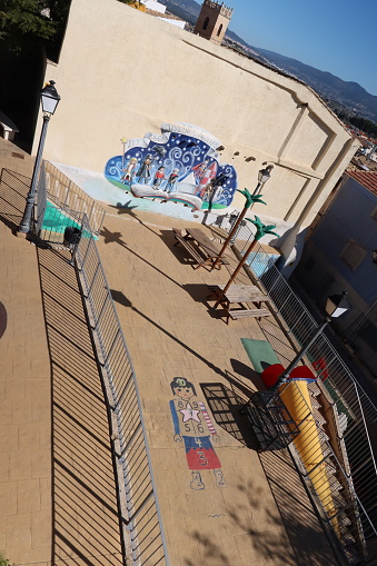 Castalla, Alicante, Spain, February 3, 2023: Murals on the walls in the Playmobil themed Children's Park in Castalla, Alicante, Spain