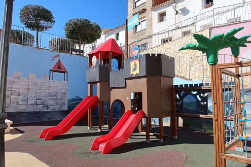 Castalla, Alicante, Spain, February 3, 2023: Castle surrounded by murals in the Playmobil themed Children's Park in Castalla, Alicante, Spain