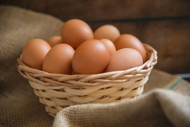 istock Group of pink eggs in a basket 1467707691