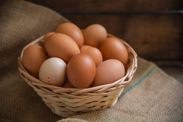 istock Group of pink eggs in a basket 1467707694