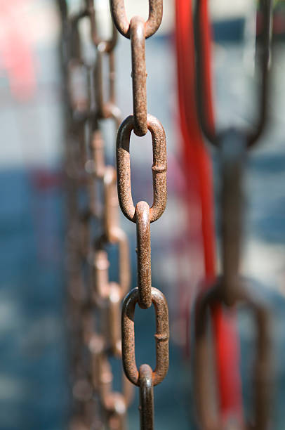 Links in a chain Links in a chain tug o stock pictures, royalty-free photos & images