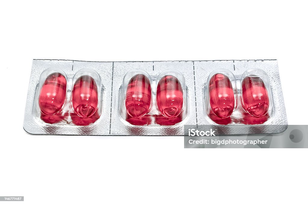 Red capsules - Cold and Flu pills Strip of red cold and flu medication capsules. Acetaminophen Stock Photo