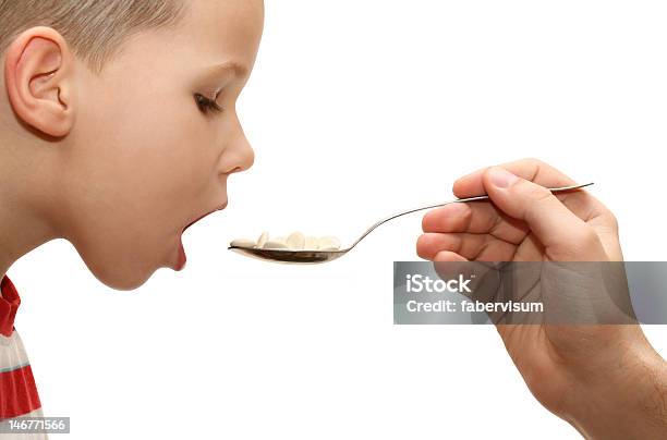 Child Taking Medicine Stock Photo - Download Image Now - Addiction, Adult, Antibiotic