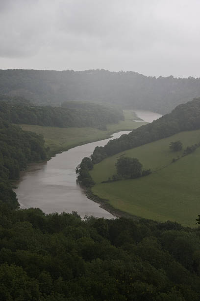 Rain and mist above the river stock photo