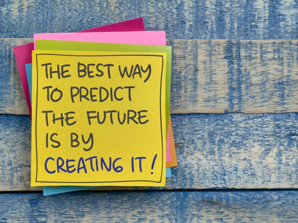 Create the future, text words typography written on paper, life and business motivational inspirational stock photo
