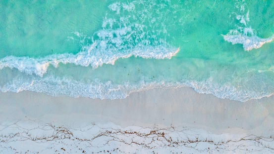 A tranquil drone shot above Grayton Beach, FL along 30A. The crystal blue waters washing against the white sands… nothing more peaceful!