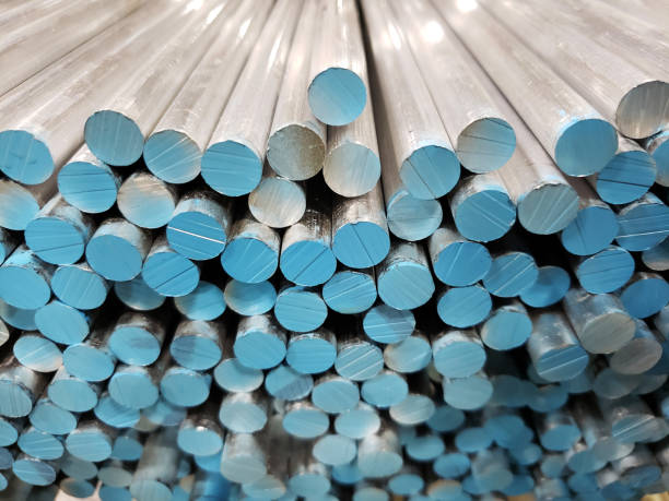 Round aluminum bar stock ready for machining.