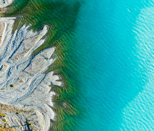 istock Turquoise water body with snow. 1467719762