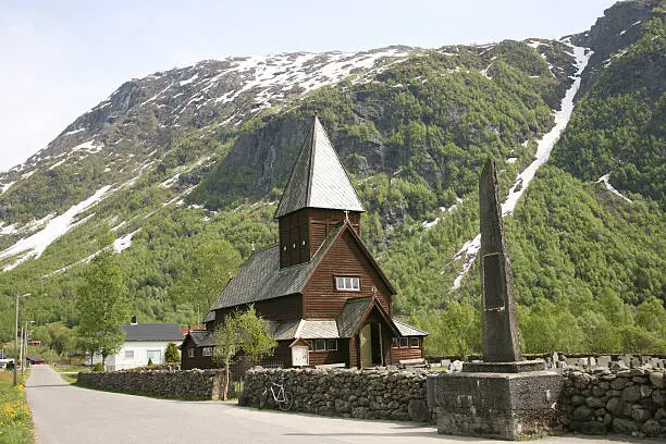 Stavechurch in a norwegian valley during spring
