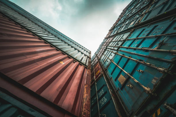istock Cargo container for overseas shipping on high stack look up from ground . Logistics supply chain management and international goods export concept . 1467723129