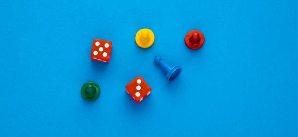 istock Board game pieces and dice - Blue eva rubber background 1467728544