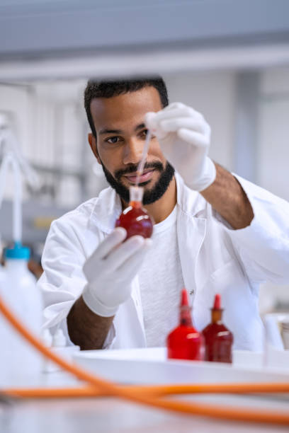 istock Chemistry professor and students in the laboratory 1467732047