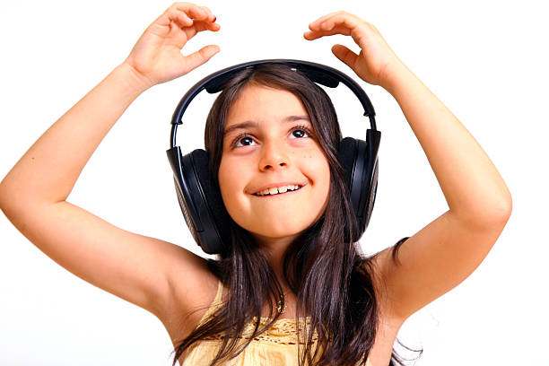 Girl enjoying music stock photo