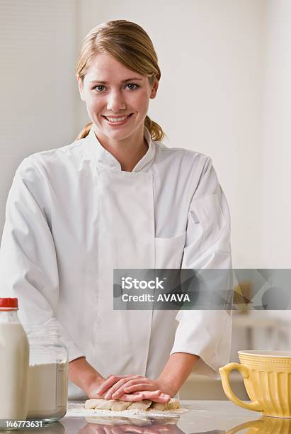 Pastry Chef Kneading Dough Stock Photo - Download Image Now - 20-29 Years, Adult, Adults Only