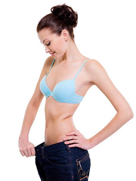 istock Beautiful female  Losing Weight 146774004