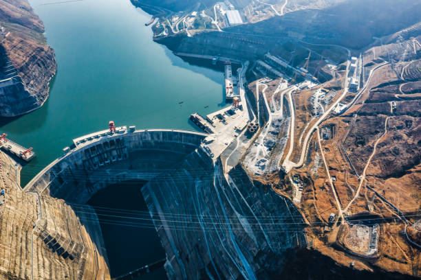 вид с воздуха на байхетанский гэс, китай. - hydroelectric power station фотографии стоковые фото и изображения