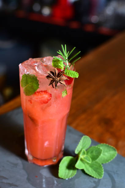 istock berry alcoholic iced drink fruit juice with cinnamon isolated on black background 1467742221