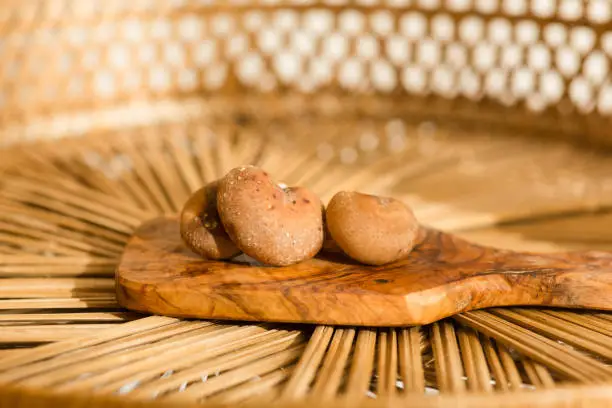 Naturally Heart-Shaped Shiitake Mushrooms  on an Olive-Wood Cutting Board on a Rattan Surface with a Bright Golden Brown Colored Background During Valentine's Day Week in 2023.

Shiitake mushrooms have one of the highest amounts of natural copper, a mineral that supports healthy blood vessels, bones, and immune support. A 1/2 cup of shiitake mushrooms gives you 72 percent of your daily recommended intake (DRI) of this mineral. The mushrooms are also a rich source of selenium, providing 33 percent of your DRI.