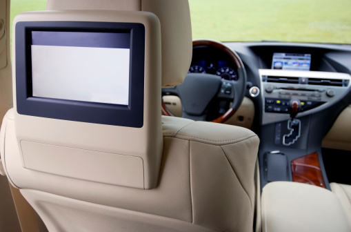 Headrest TV with blank screen and view of the front of the vehicle