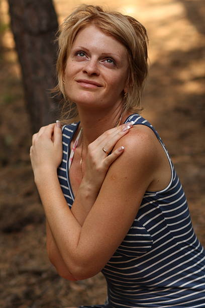 Woman in forest stock photo