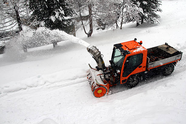 istock Large snow blower clearing the road 146774818