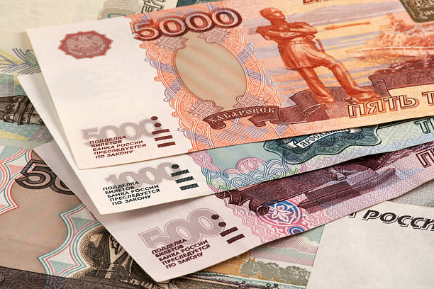 Russian roubles Russian roubles. 500, 1000 and 5000 roubles banknotes russian culture photos stock pictures, royalty-free photos & images