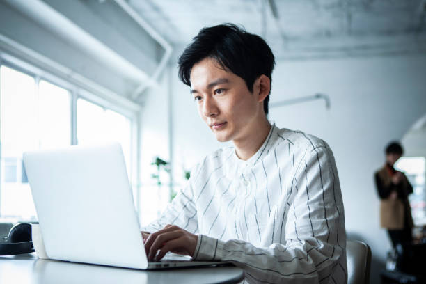 istock Pensive man working on laptop in the office 1467754629