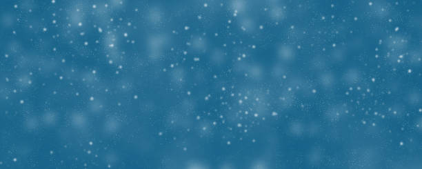 istock Winter blue background with snowfall wide banner 1467760595