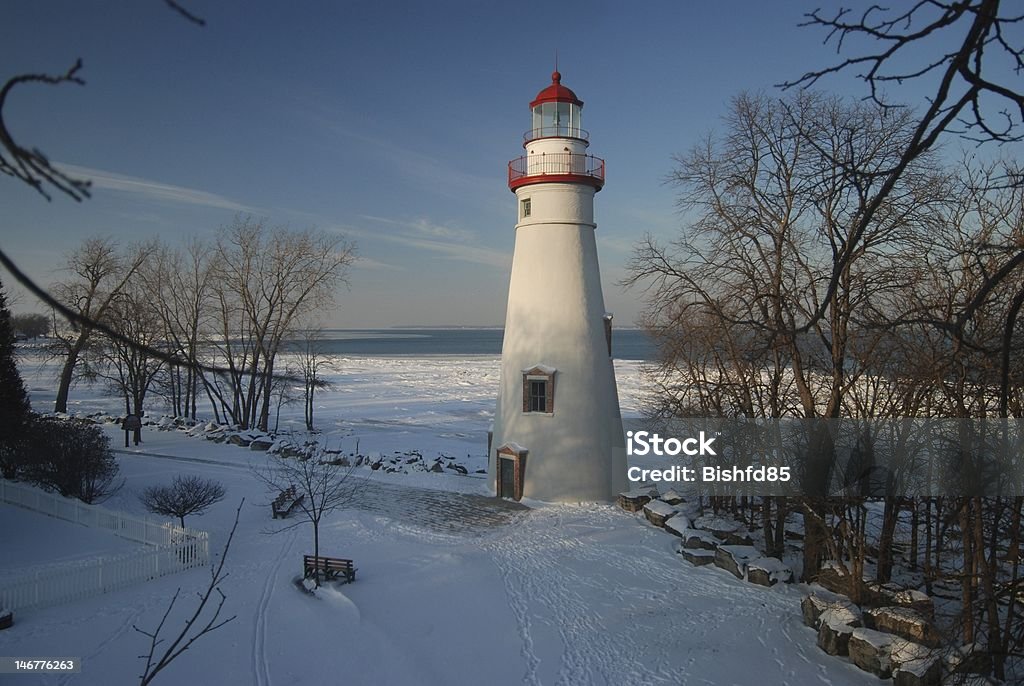 winter light Marblehead lighthouse located in Marblehead, Ohio on lake Erie. Piture taken from approximately 30 feet in a tree in January 2010. Taken with a Nikon D80. Ohio Stock Photo