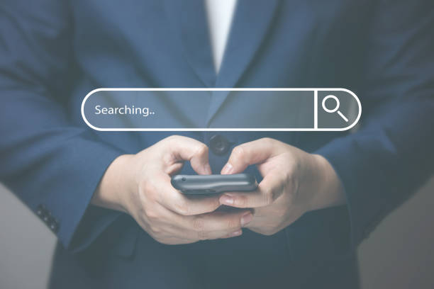 istock Businessman hand typing on smartphone with bar tool to search for information 1467766382