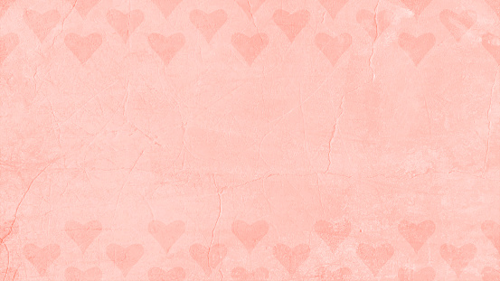 A border pattern at the top and bottom edges of soft pastel peach or pale pink coloured abstract melting hearts making beautiful love theme romantic backdrop over light faded pink backgrounds. Apt for greeting cards, love letter head pads, wallpaper, gift wrapping paper sheet, posters, banners, backdrops or templates related to dating, romance Valentine's Day, weddings, marriages, Anniversary and 14th February.