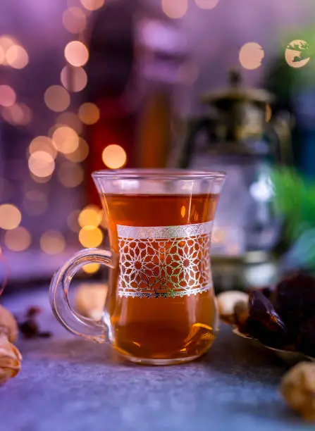 Cup of Black tea with bokeh background