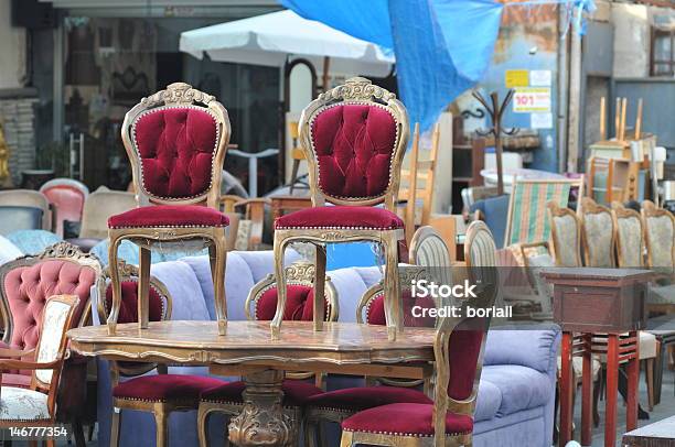 Antique Chairs On A Table At Flea Market Stock Photo - Download Image Now - Flea Market, Furniture, Chair