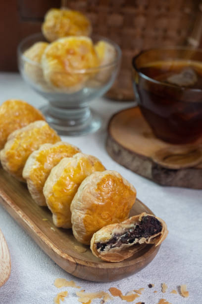 istock selective focus on crispy dry bakpia snacks usually served with hot tea suitable for eating when breaking the fast in the month of Ramadan. soft focus 1467773845