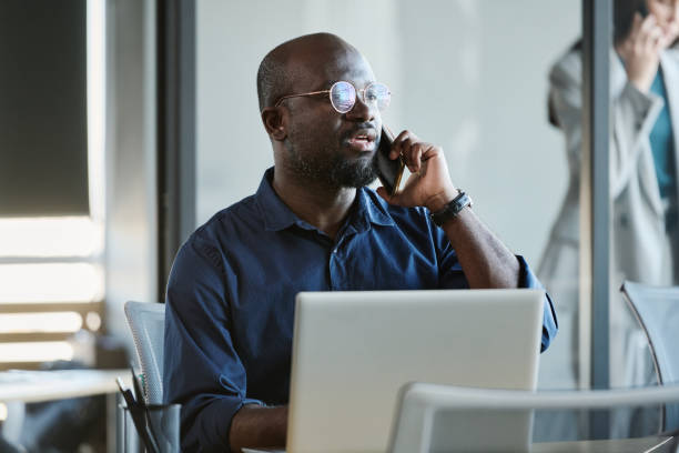 istock Confident African American employee making appointment with client 1467780457