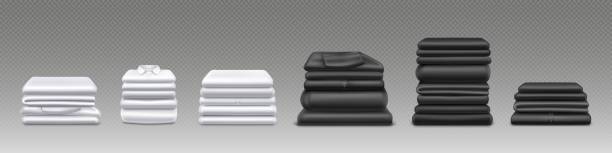 Clean white and black clothes stacks Clean white and black clothes stacks, folded shirts, sweaters and pants isolated on transparent background. Stacks of garment after laundry, washed and ironed apparel, vector realistic illustration folded sweater stock illustrations