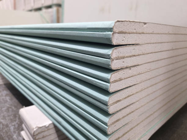 istock water resistant plasterboard sheets stacked in a hardware store. 1467782790