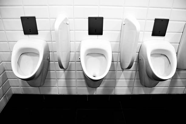 istock Public toilet urinals 146778491