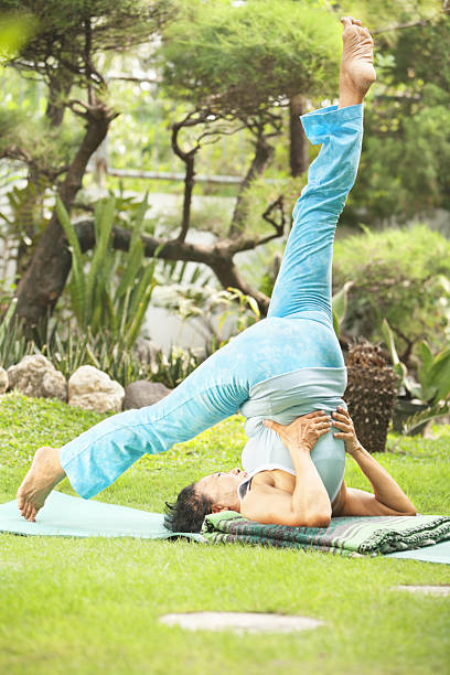 istock Asian senior old woman doing yoga 146778542