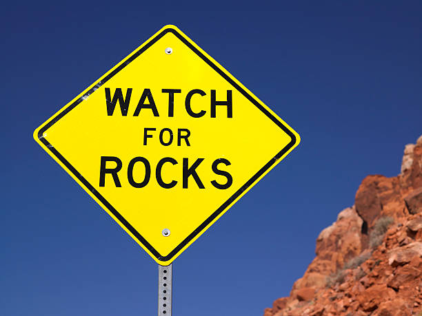 istock Watch For Rocks Sign Next to Highway 146778593