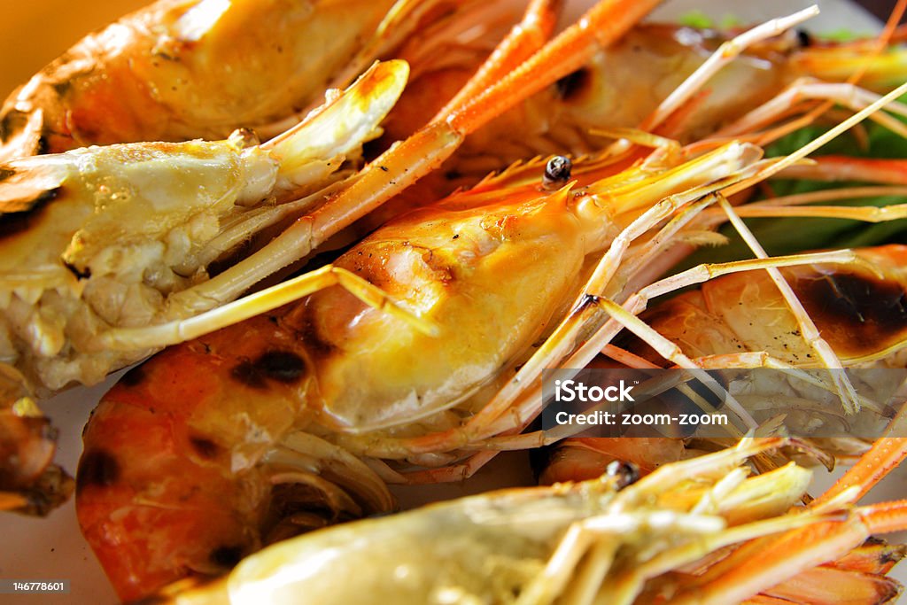 Grilled shrimps Grilled big shrimps on plate close up Appetizer Stock Photo