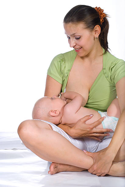 istock The woman feeding a baby 146778692